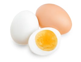 boiled egg and half isolated on white background