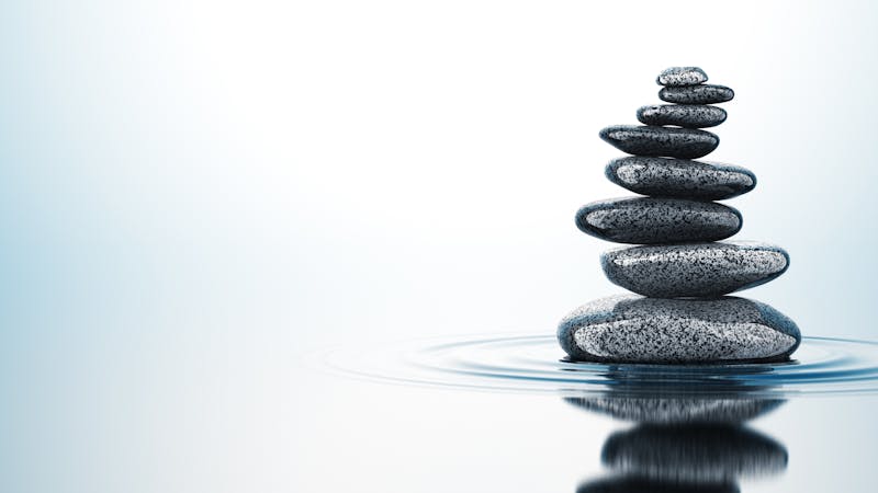 Balancing Stones On The Water