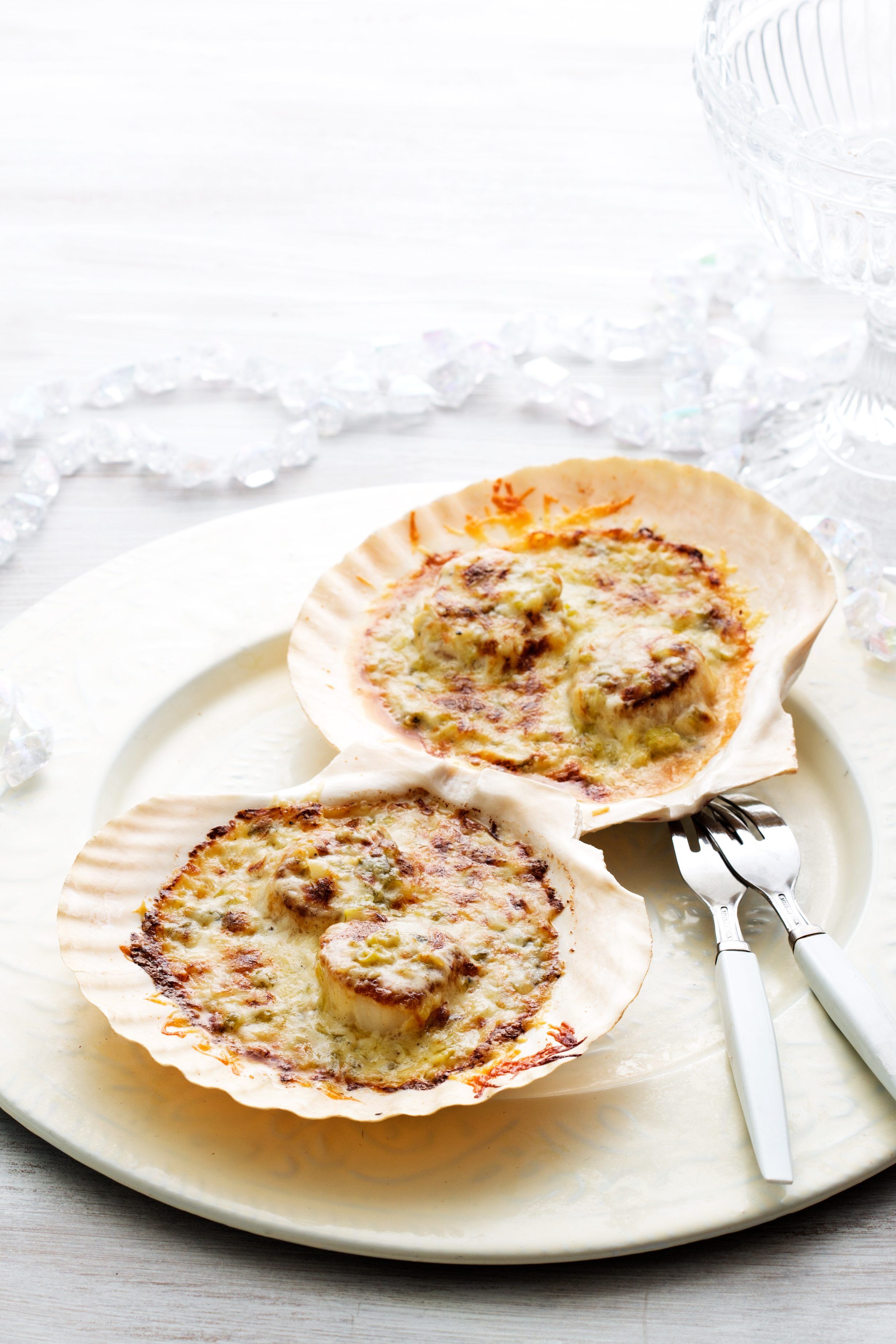 Vieiras con queso parmesano