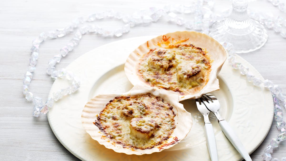 Vieiras con queso parmesano
