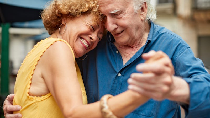 Senior couple dancing tango in the streets of San Telmo.