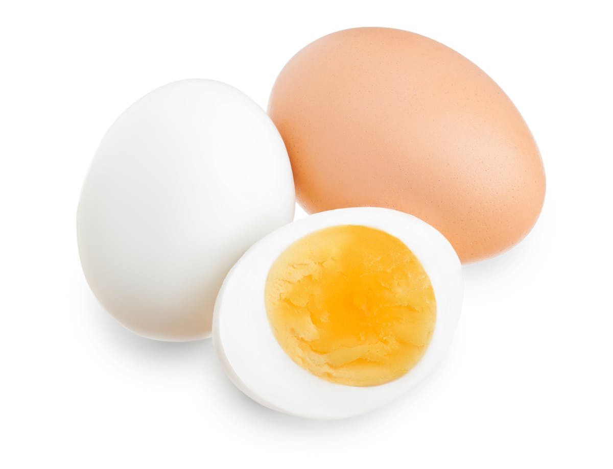 boiled egg and half isolated on white background