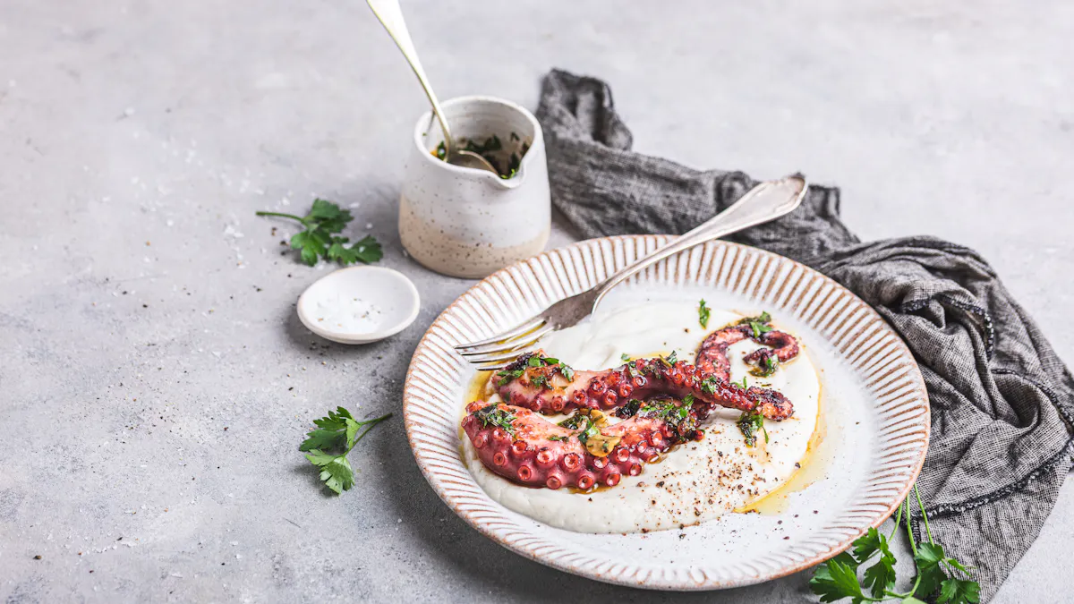 Pulpo a la brasa con puré de coliflor