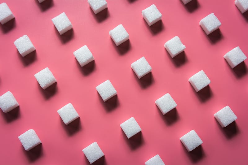 Pattern Sugar Cubes on a Pink Background