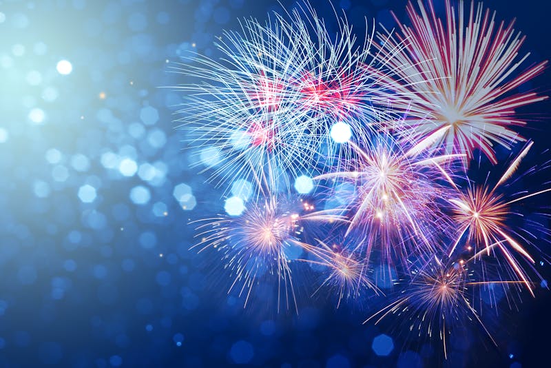 Abstract fireworks celebration on bokeh festive  light background