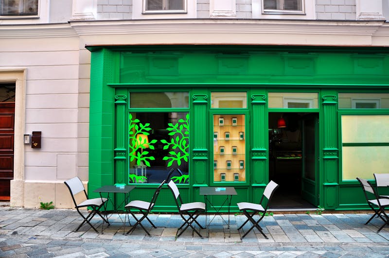 Green cafe on a small street