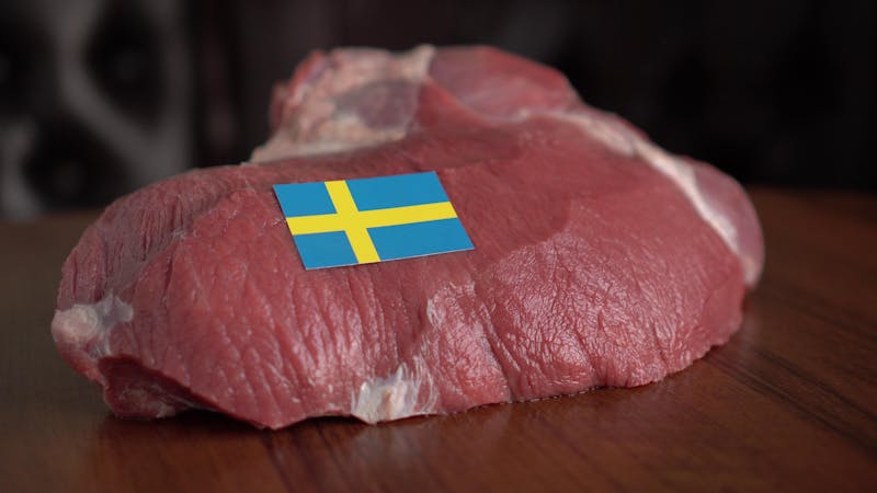 Raw meat and flag of Sweden
