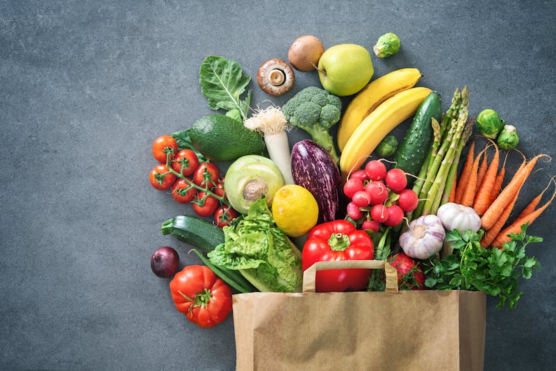 Shopping bag full of fresh vegetables and fruits