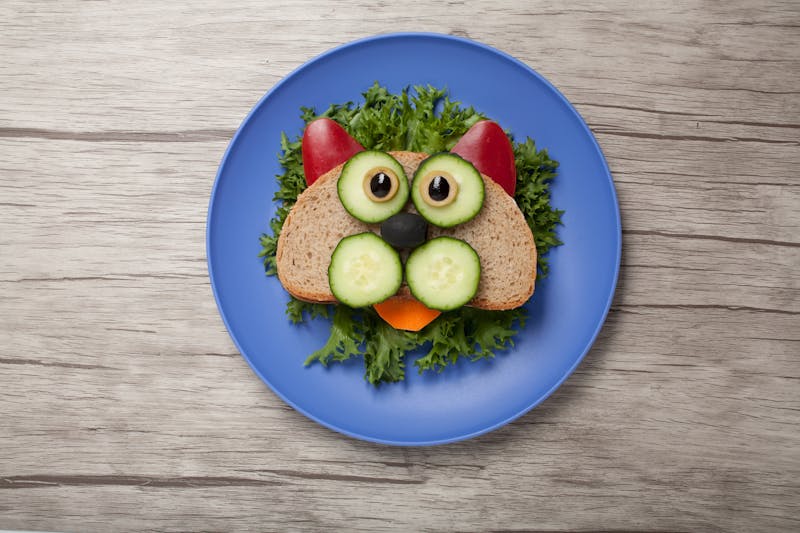 Cat made of bread and vegetables