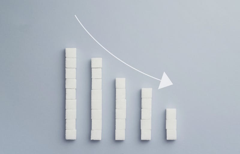 Negative graph chart made of sugar cubes