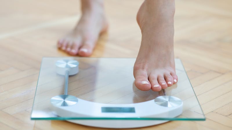 Female feet weighing scale