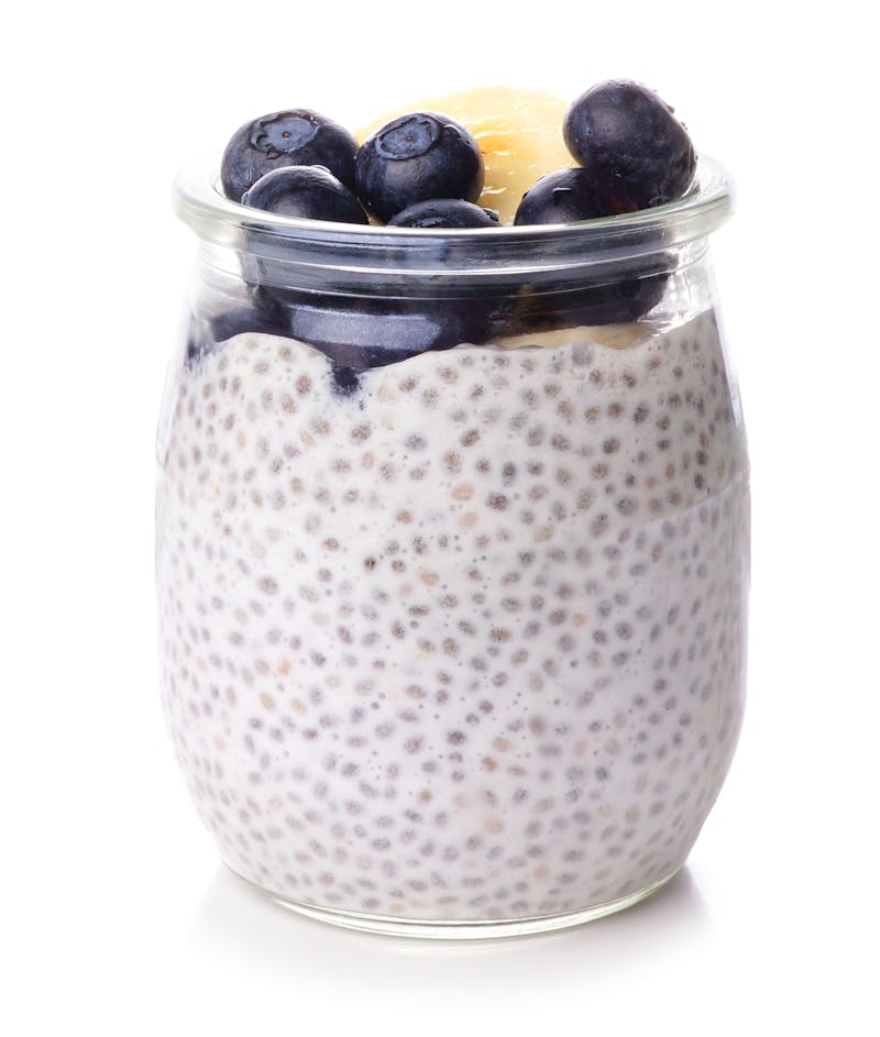 Healthy blueberry and banana chia pudding isolated on white