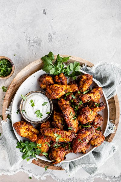 Indisk butterchicken med kycklingvingar<br />(Förrätt)