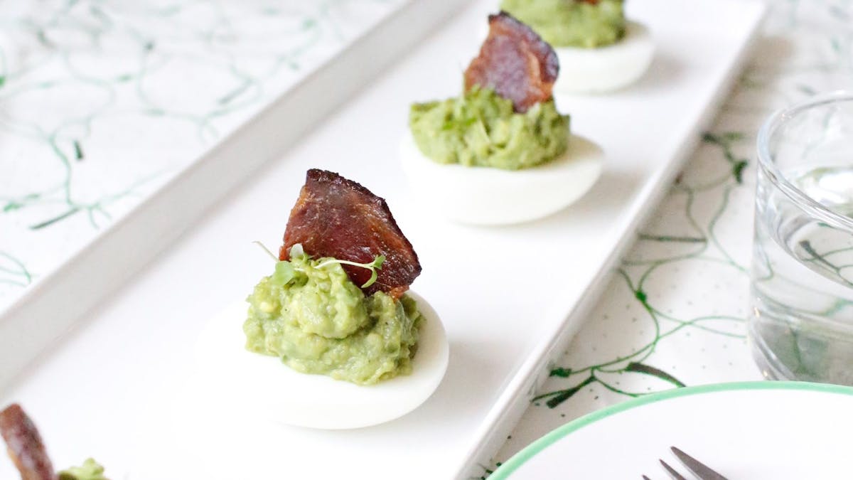 Keto avocado eggs with bacon sails
