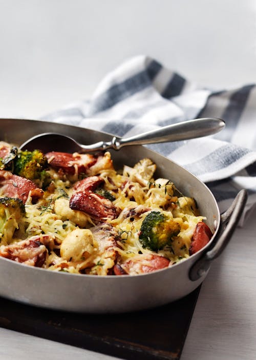 Broccoli and cauliflower gratin with sausage