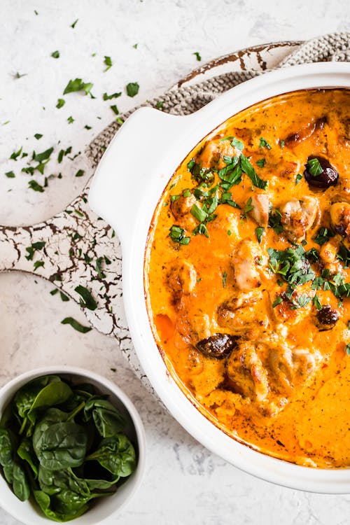 Keto pesto chicken casserole with feta cheese and olives