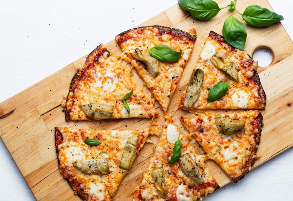 Low carb cauliflower pizza with artichokes
