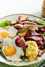 Keto pastrami salad with fried eggs and croutons