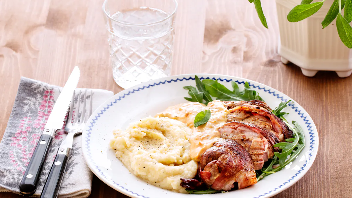 Low carb bacon-wrapped tenderloin with roasted garlic mash