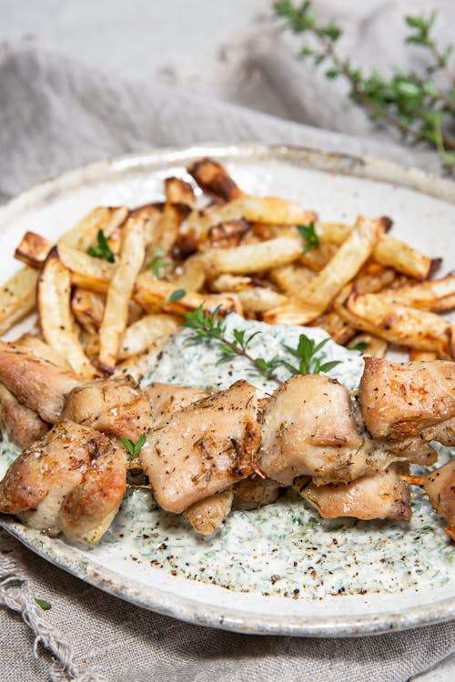 Chicken skewers with low carb fries and spinach dip