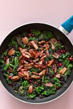 Keto fried kale with pork and cranberries