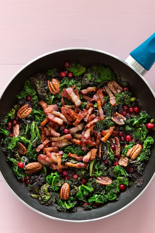 Keto fried kale with pork and cranberries