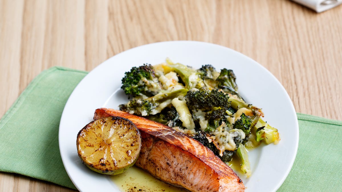 Keto fried salmon with broccoli and cheese