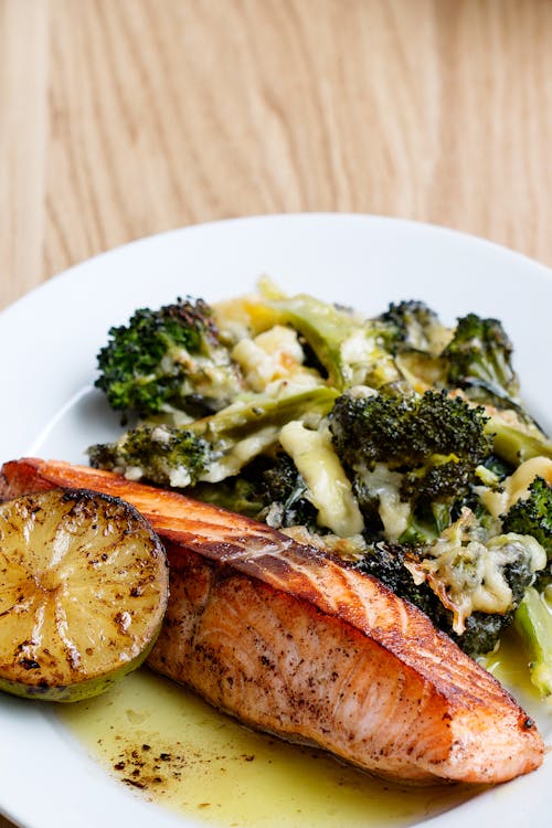 Keto fried salmon with broccoli and cheese