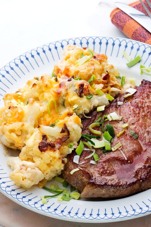 Pork shoulder chops with cauliflower au gratin