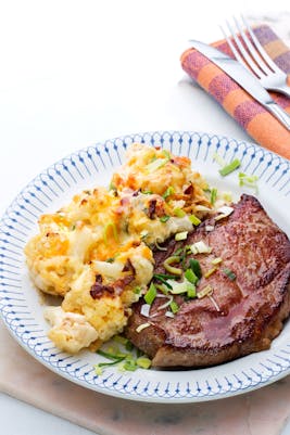 Pork shoulder chops with cauliflower au gratin
