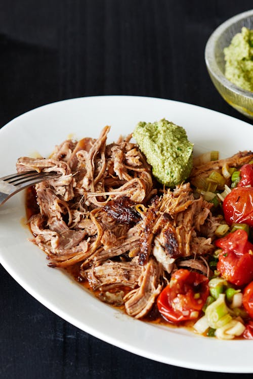 Keto pulled pork with roasted tomato salad