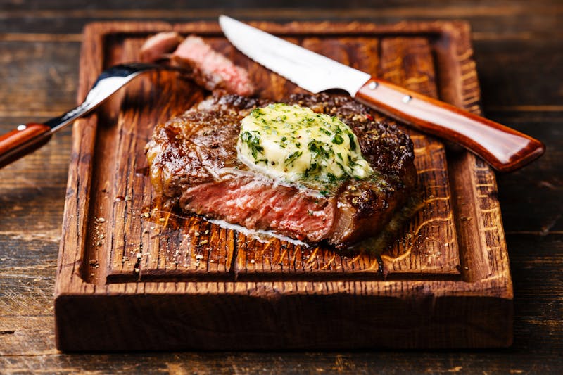Grilled steak Ribeye with herb butter
