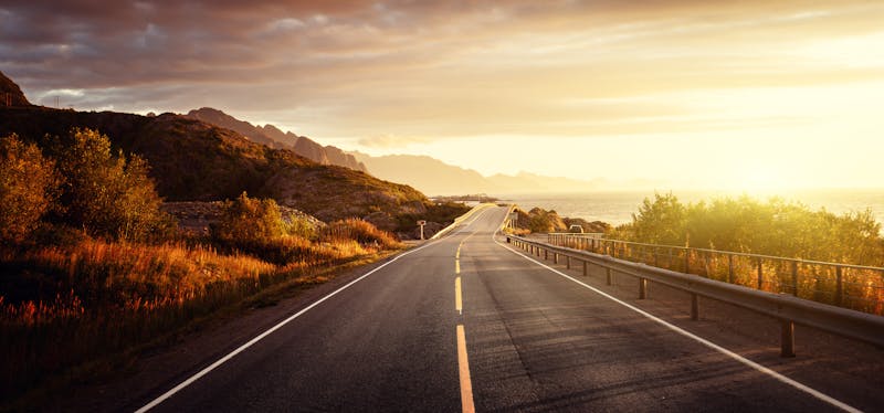 road by the sea in sunrise time, Lofoten island, Norway