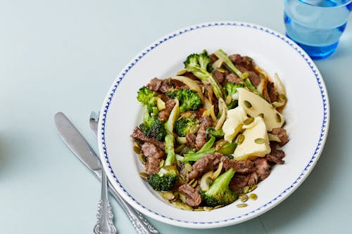 Steak and broccoli stir-fry with toasted pumpkin seeds