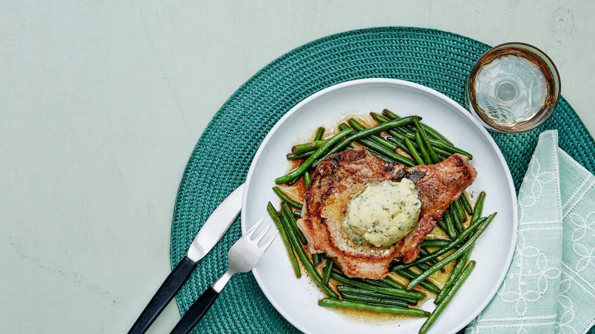 Pork chops with green beans and garlic butter