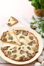 Keto white pizza with mushrooms and pesto