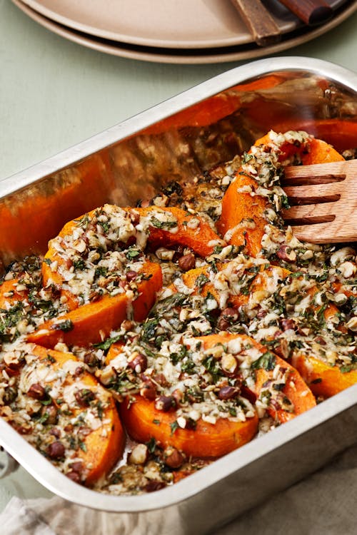 Roasted pumpkin with nuts and manchego cheese