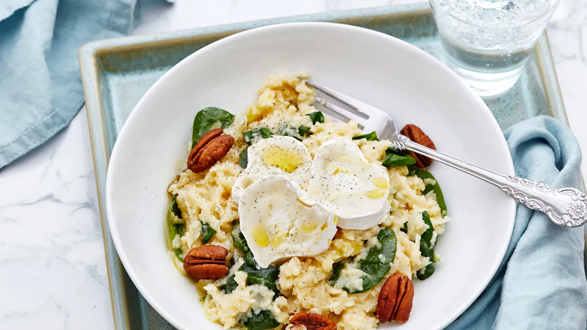Creamy low carb cauliflower risotto with spinach and goat cheese