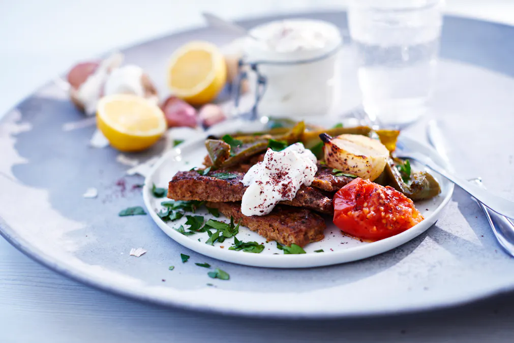 Keto shish kebab with garlic cream and roasted vegetables