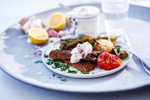 Keto shish kebab with garlic cream and roasted vegetables