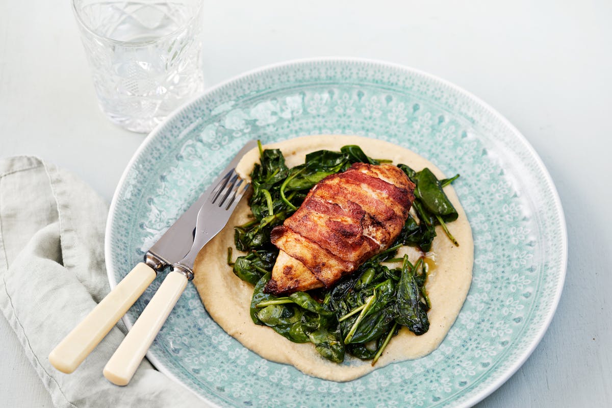 Bacon-wrapped chicken breast with cauliflower purée