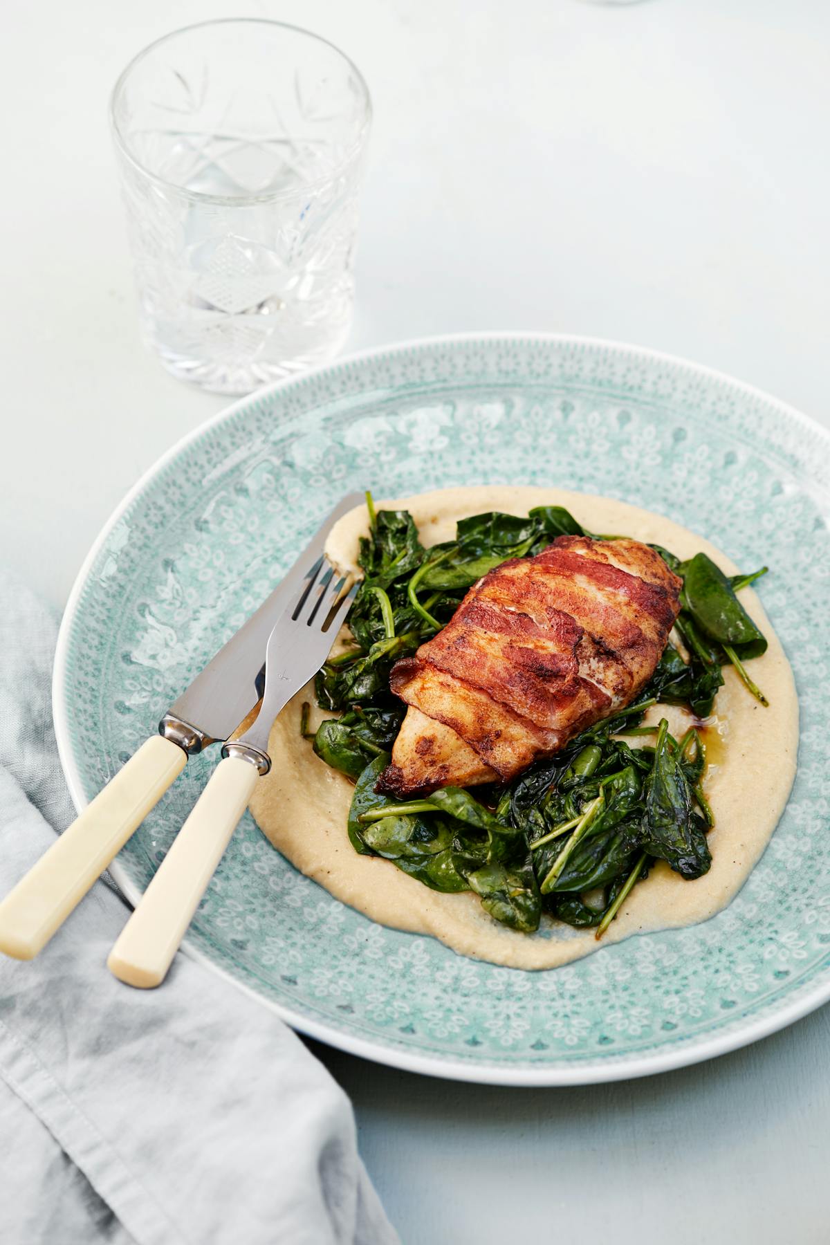 Bacon-wrapped chicken breast with cauliflower purée