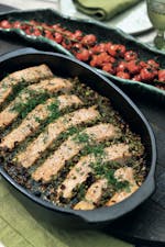 Salmon with olive-pistachio tapenade and tomatoes