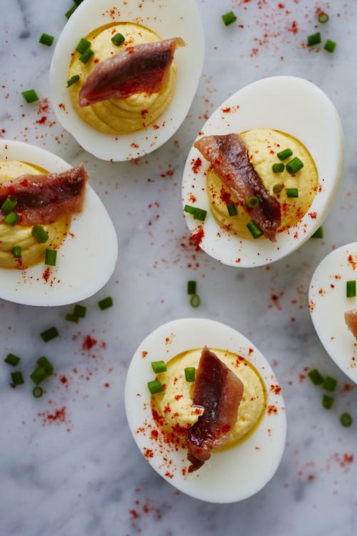 Deviled eggs with anchovies and rosemary