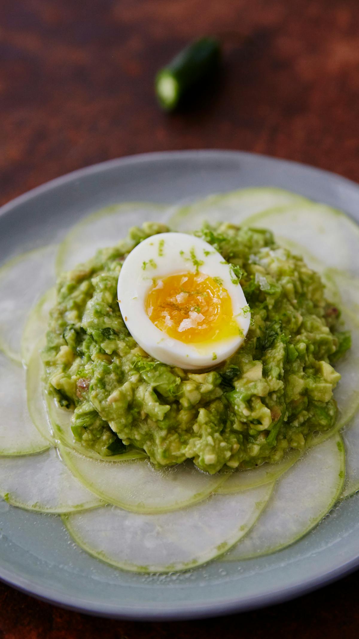 Shaved kohlrabi with smashed avocado, anchovies and soft-boiled eggs