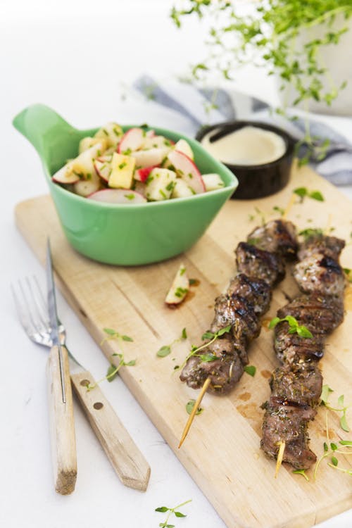 Lemon lamb skewers with keto radish and daikon salad