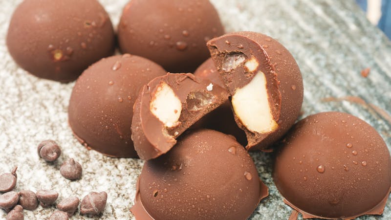 Chocolate-covered macadamia nut fat bombs - Suzanne Ryan