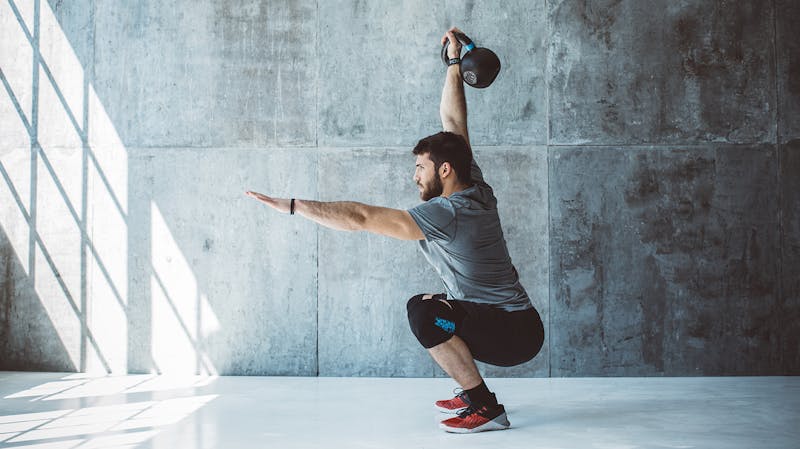 man with kettlebell