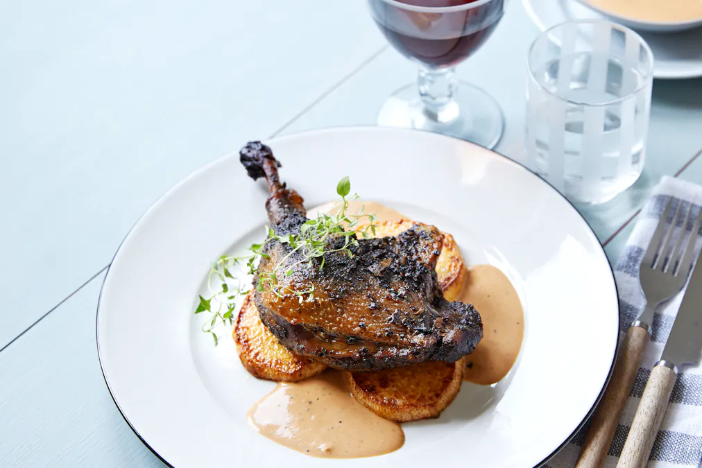 Duck confit with roasted rutabaga and balsamic sauce