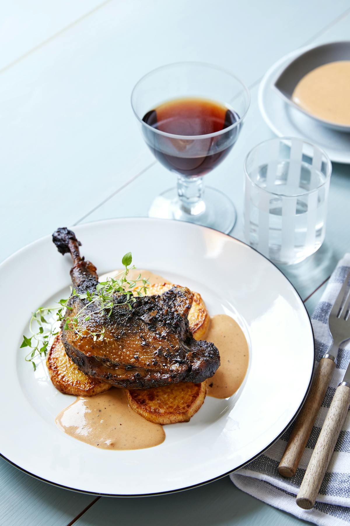 Duck confit with roasted rutabaga and balsamic sauce